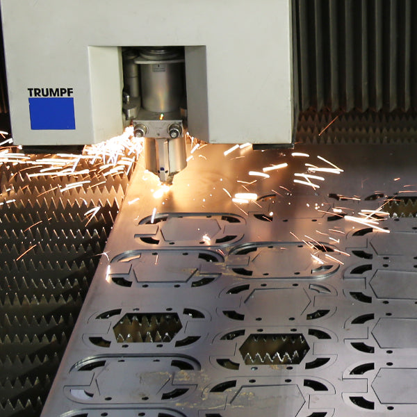 Metal being cut in a laser machine