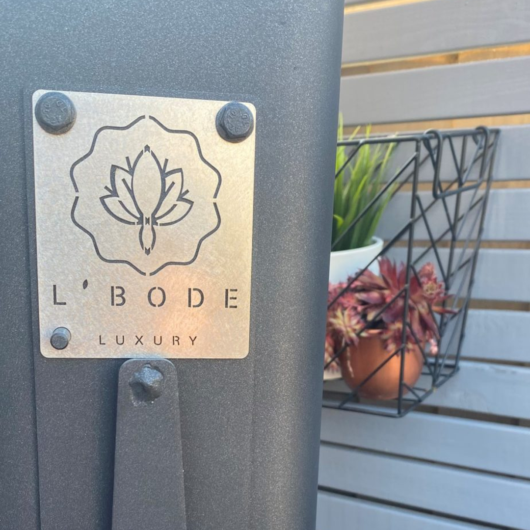 L'Bode Luxury Brand Decal on side of a fireplace